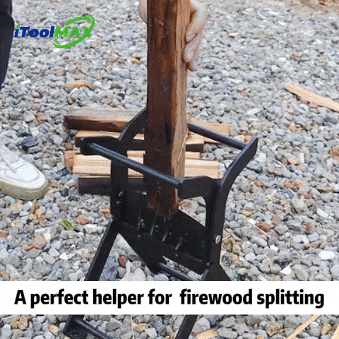 Foldable kindling log splitter holding a wood piece on gravel, a helper for firewood splitting