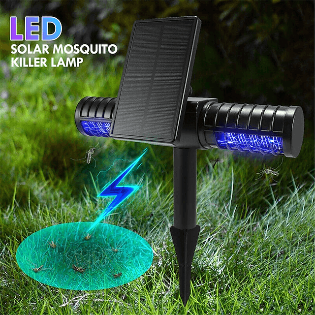 Solar mosquito killer lamp with ground spike and solar panel on a lawn