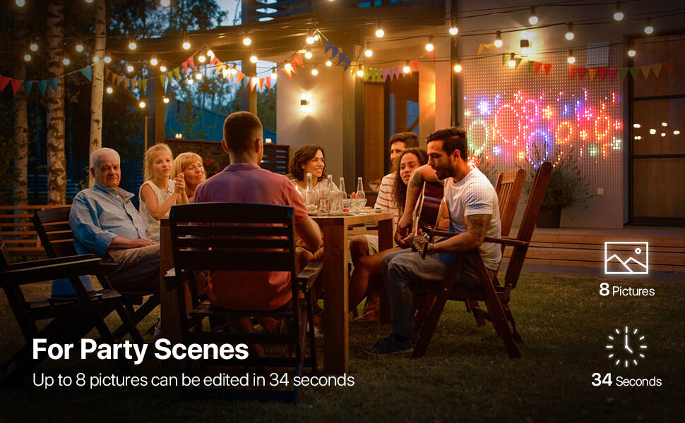 Family dinner in a backyard with an LED wall display showing colorful pictures