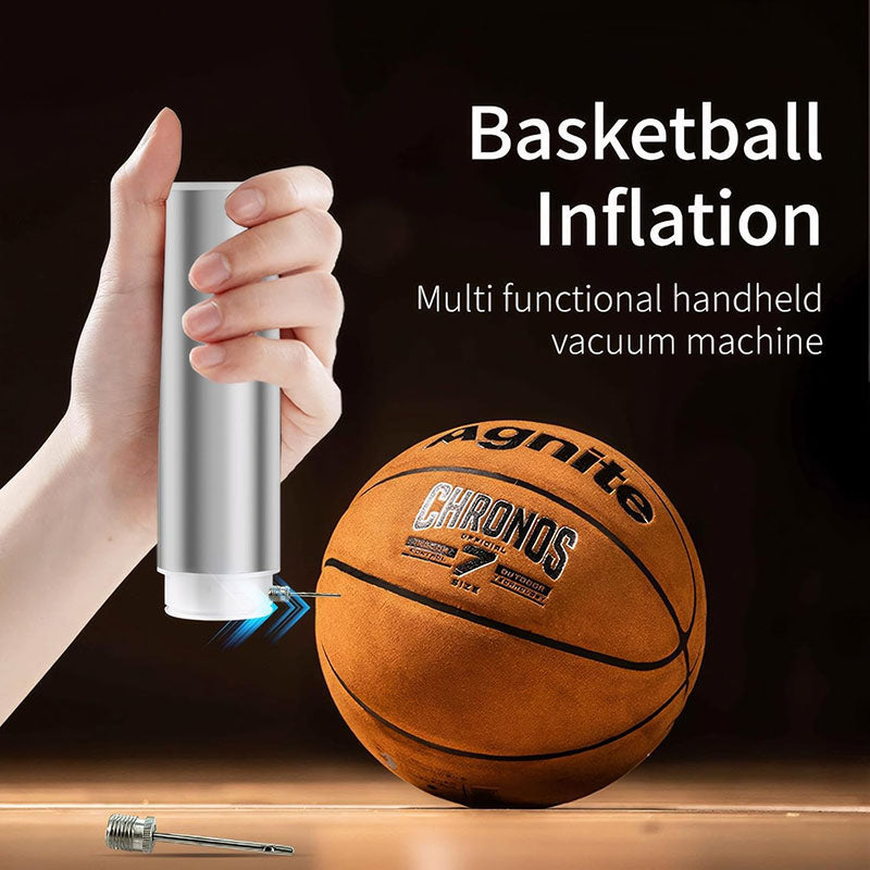 Handheld vacuum sealer inflating a basketball, with a metal inflation needle on the table