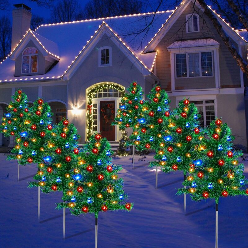 itoolmax solar christmas tree lights with 4 vibrant colors outdoors
